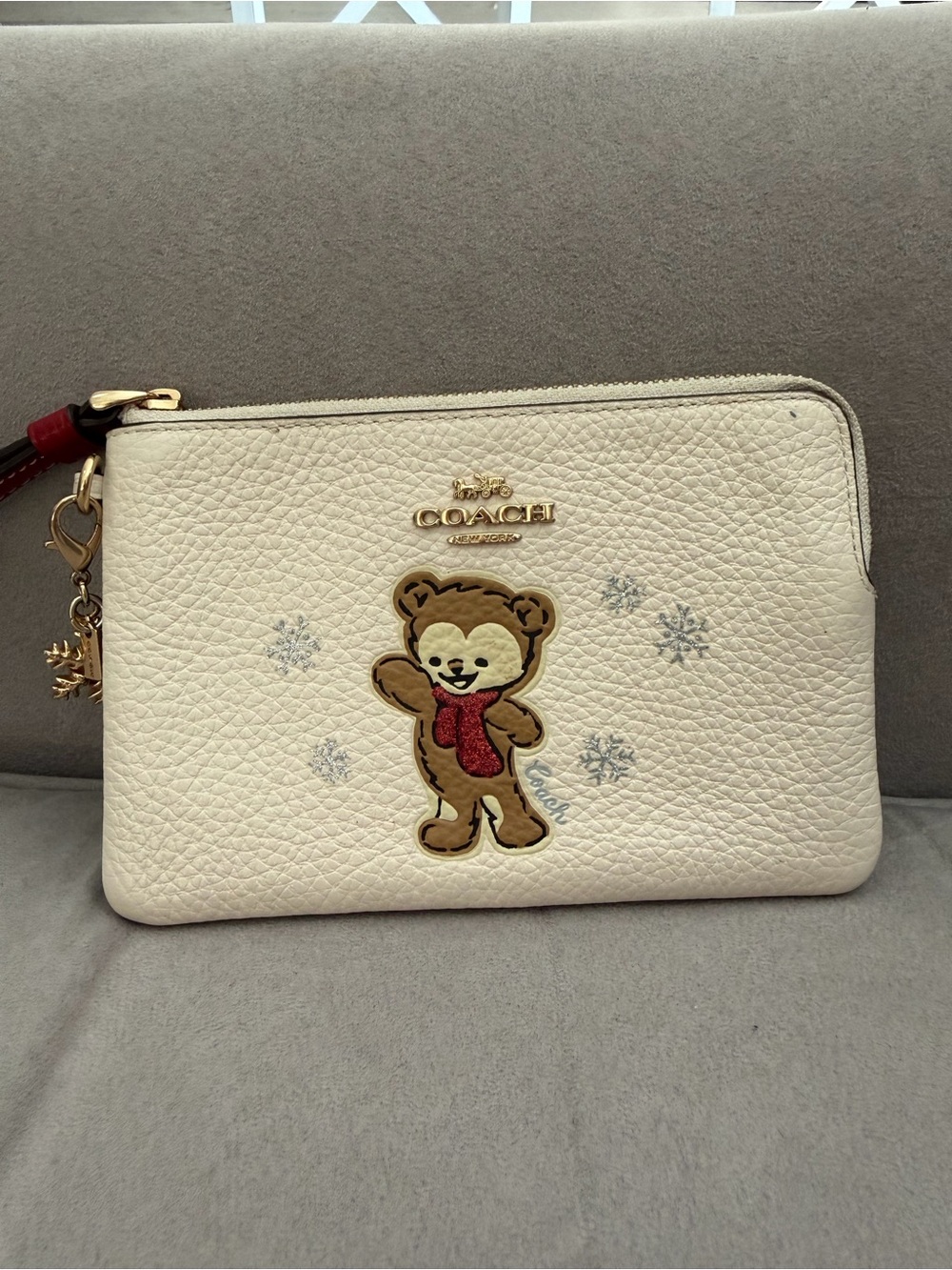 COACH White Pebbled Leather Bear Charm Wristlet with Gold Hardware